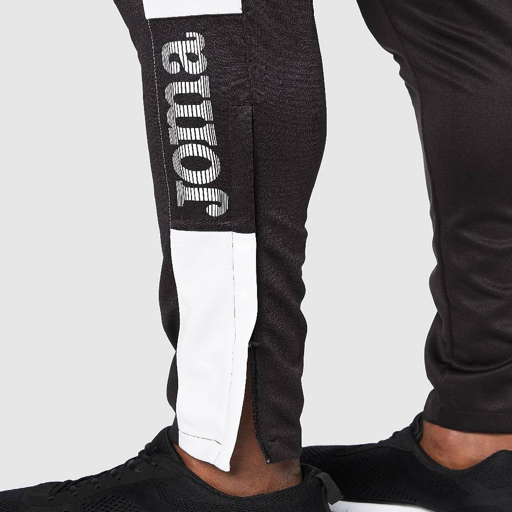 Joma pantalón largo champion IV negro-blco